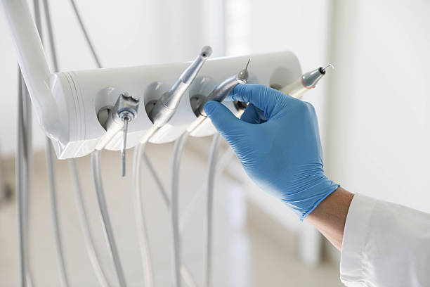 Professional Tooth Extraction technician working in Emerald Lake Hills, CA